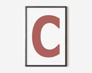 Modern art print with an uppercase Nantucket red letter C on a white background.