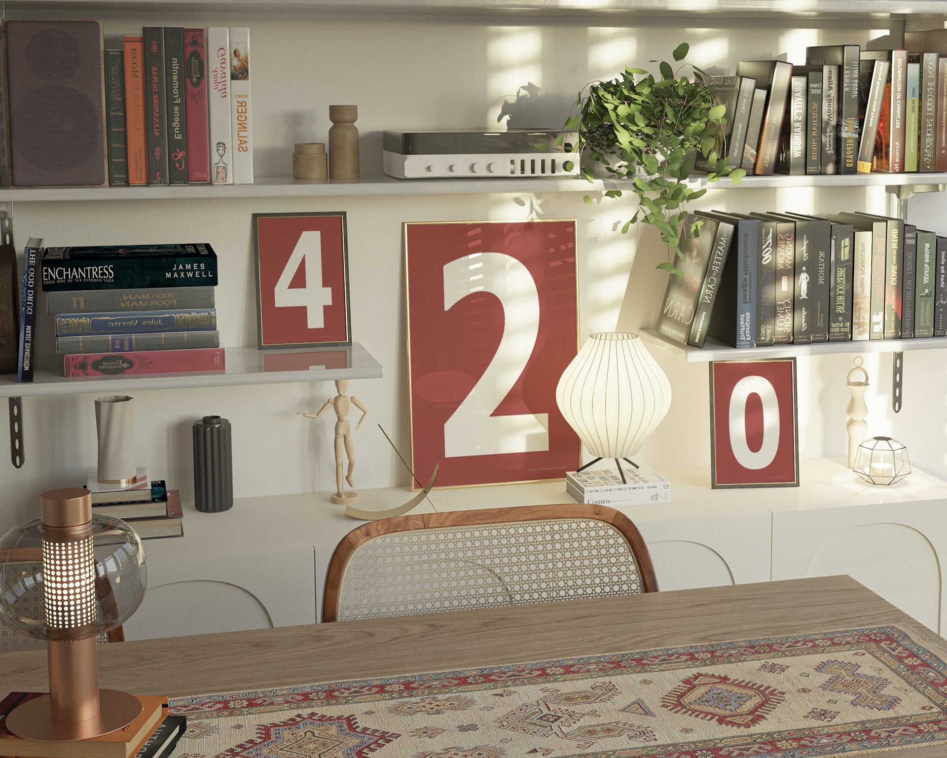 Three Nantucket red and white framed number art prints spelling out 420 on an eclectic and modern bookshelf.