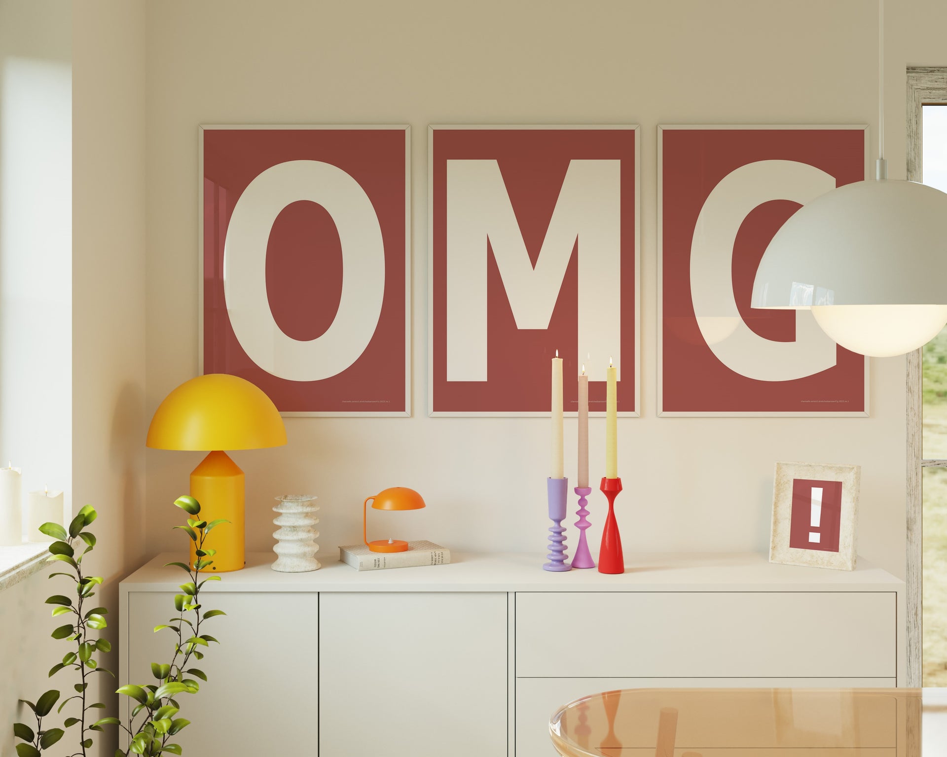 Three framed Nantucket red and white letter art prints spelling out OMG hanging above a credenza.